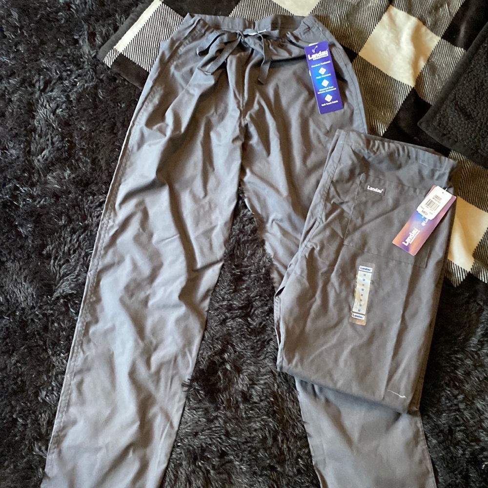 Two pairs of scrubs